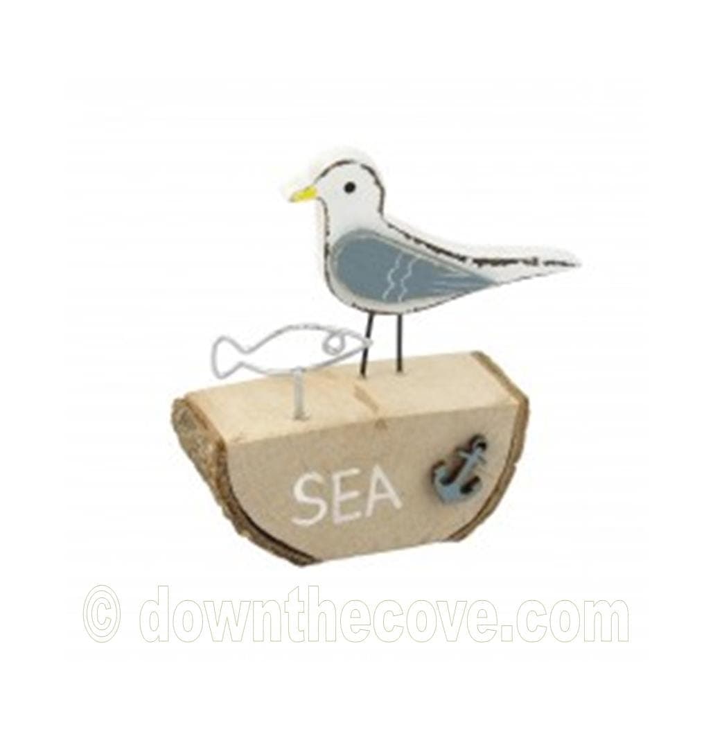 Wooden Seagull with Wire Fish Ornament on Log product image 1